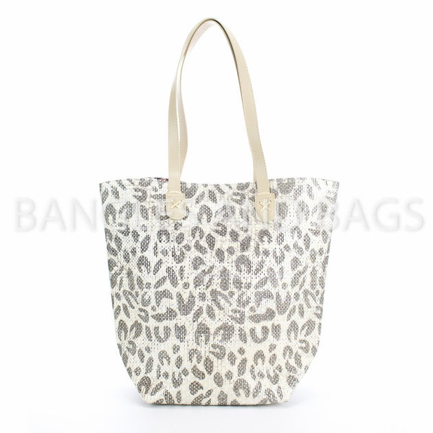 http://www.banglesandbags.com/cdn/shop/products/alex-metallic-tote-cheetah-silver-off-white-bags-bangles-and-bags_1200x630.jpeg?v=1626898163